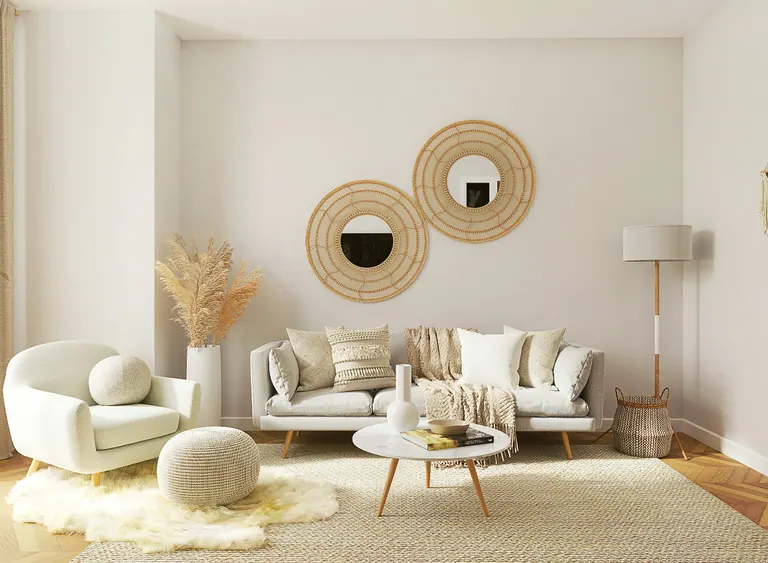 A warm finished living room with assembled furniture.